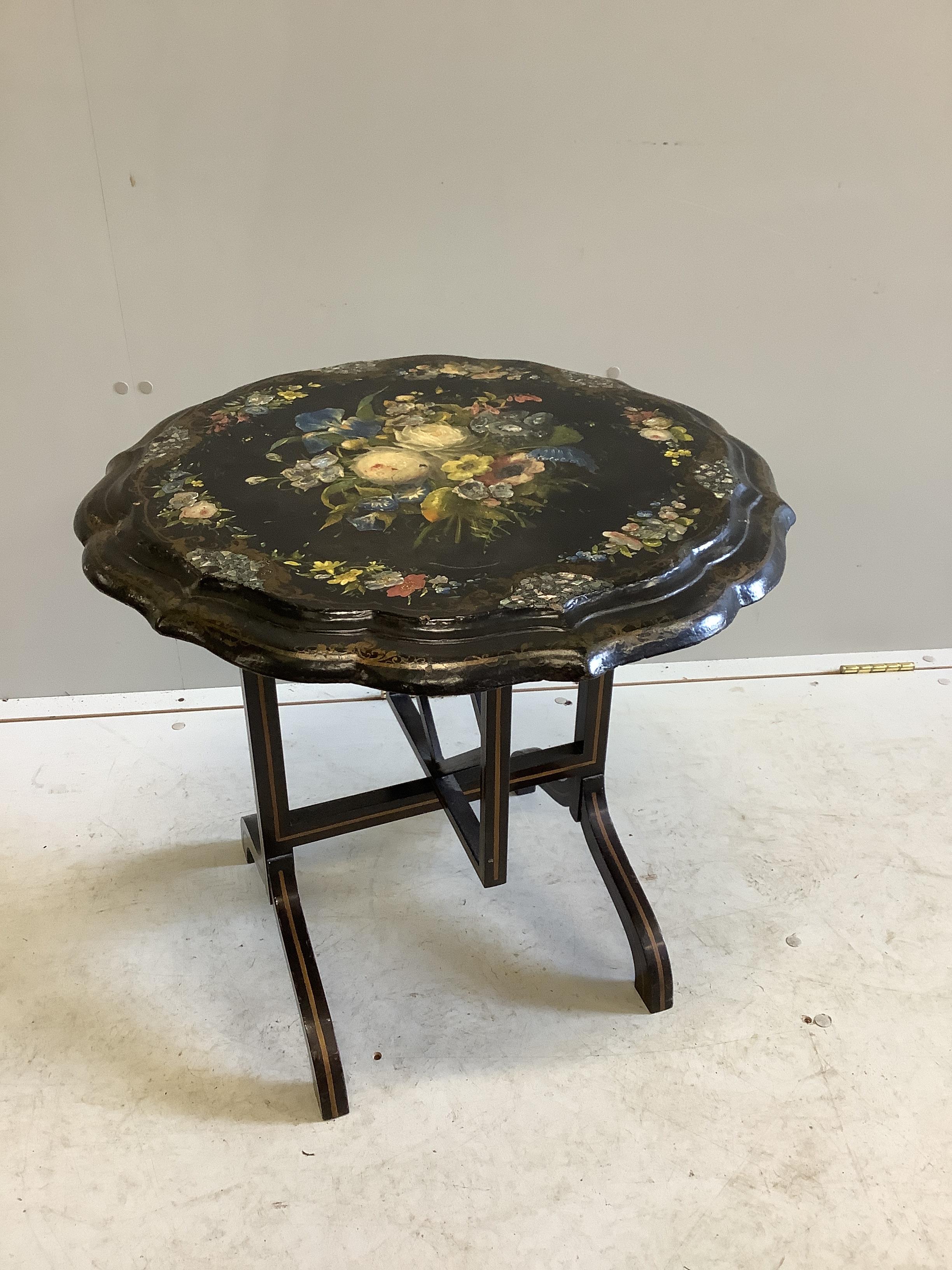 A Victorian painted and papier mache circular tilt top occasional table, diameter 59cm, height 58cm